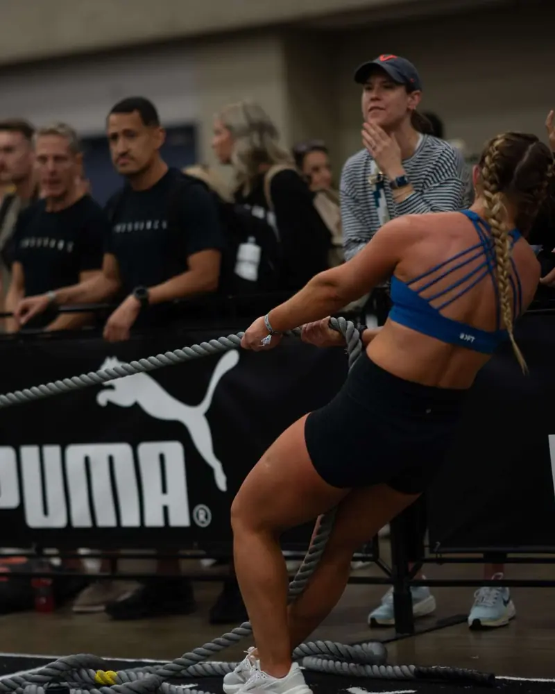Athlete pulling a sled during HYROX training at Hunger in the Wild in Dallas